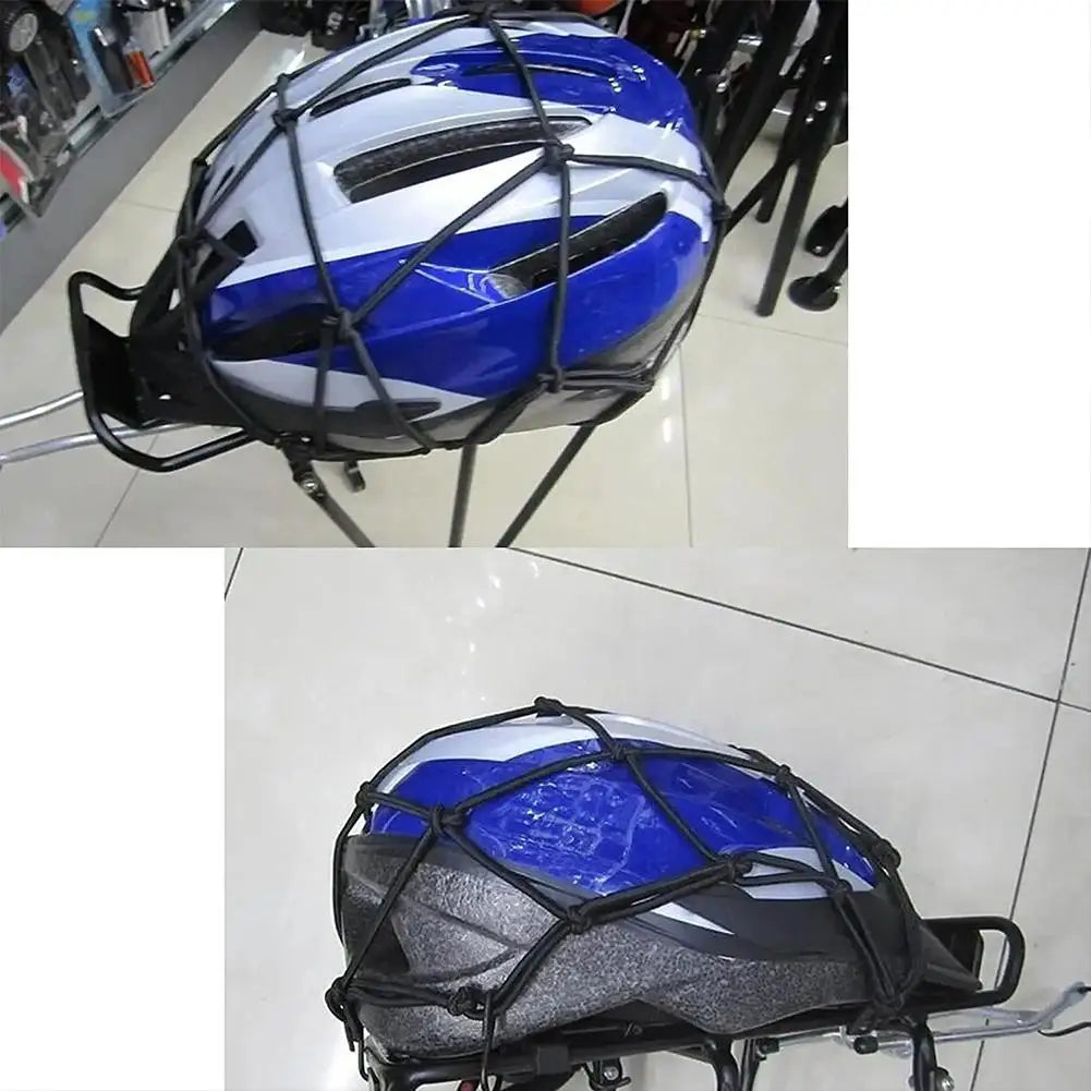 A black and blue universal motorcycle bungee cargo net with scratch-free hooks mounted on a rack.
