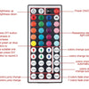 An electronic device with a grid of colored buttons and controls for recording and changing light colors.