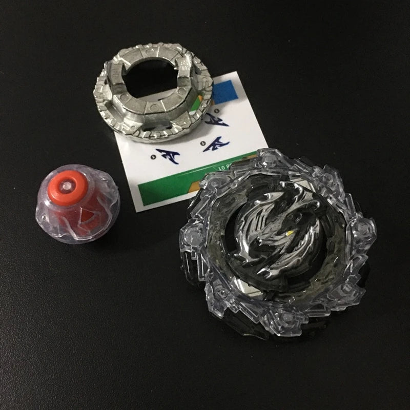 A metal battle spinning top is shown next to a small plastic component and a white card.