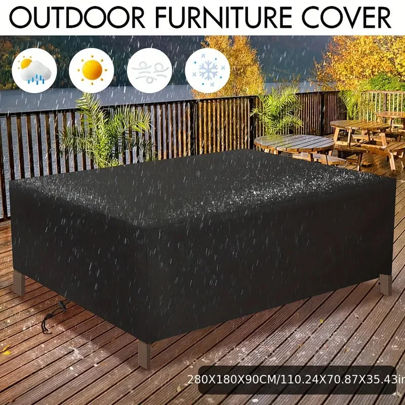 Black outdoor furniture cover protecting a wooden table and chairs from the elements.