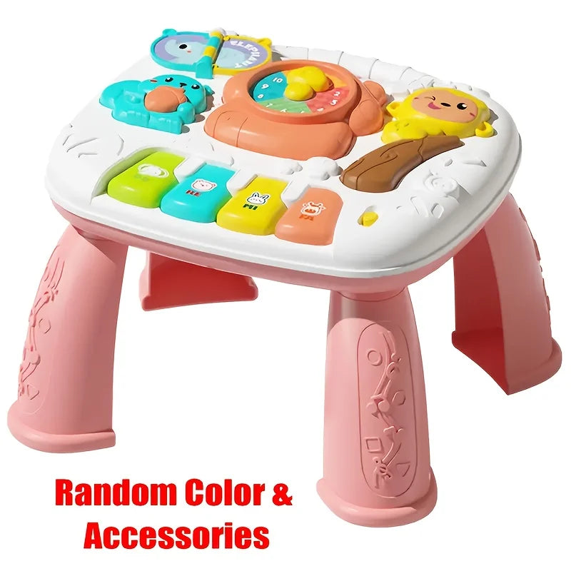A pink baby interactive activity table with colorful accessories like a piano and steering wheel.