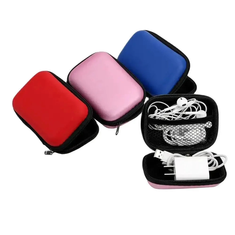 A set of colorful portable electronics organizer pouches for storing cables and accessories.