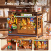 A wooden nostalgic corner shop DIY kit featuring double sliding doors and a light switch.