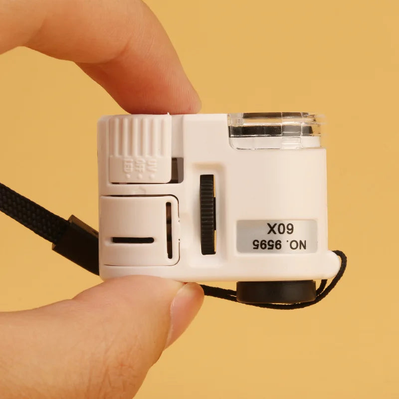 A hand holds a white handheld magnifier with an attached storage pouch and UV light, showing the device's front view.