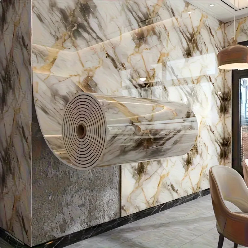 A modern interior featuring large, curved marble wall panels with gold veining and a textured finish.