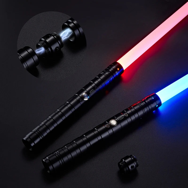 A black lightsaber with a glowing pink and blue blade is shown against a dark background.