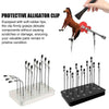 A protective alligator clip tool with soft rubber tips and a magnetic helping hands device for delicate work.