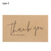 A brown greeting card with elegant black script writing that says thank you for your order