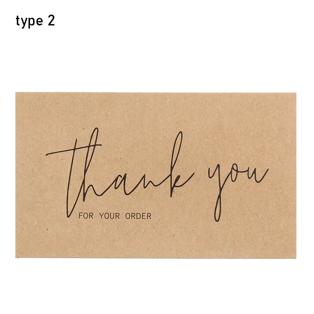 A brown greeting card with elegant black script writing that says thank you for your order