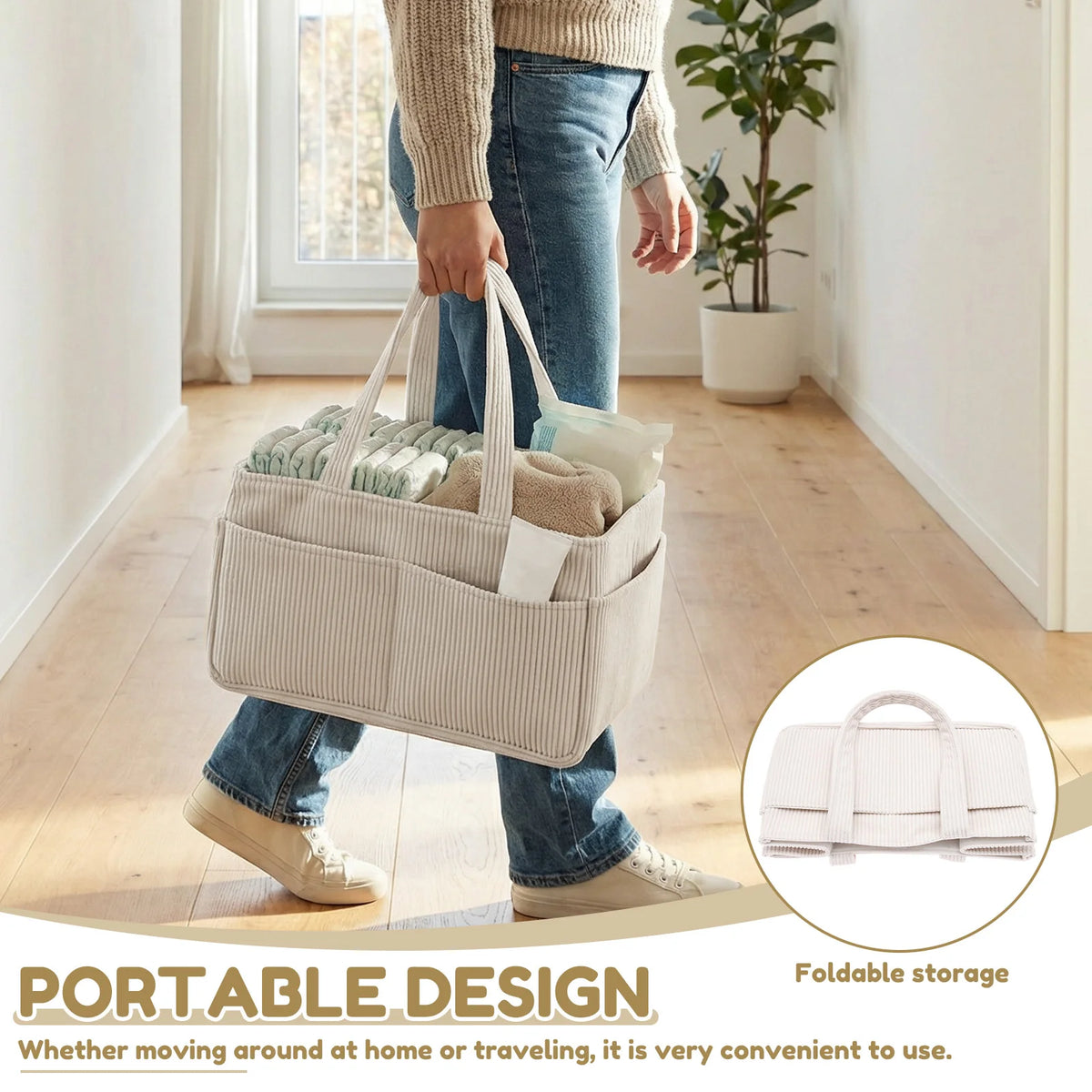 A person is holding a beige fabric diaper caddy organizer with handles, designed for portable storage.