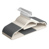 A plastic hanger with rotating hooks and a textured anti-slip base is shown.