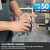 A hand is wiping a surface with a gray microfiber cleaning cloth, demonstrating the use of household cleaning towels.