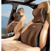 A tan memory foam car seat features a headrest and lumbar support cushion for comfort.