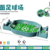 A green tabletop soccer field set with goals and players, packaged for family fun.