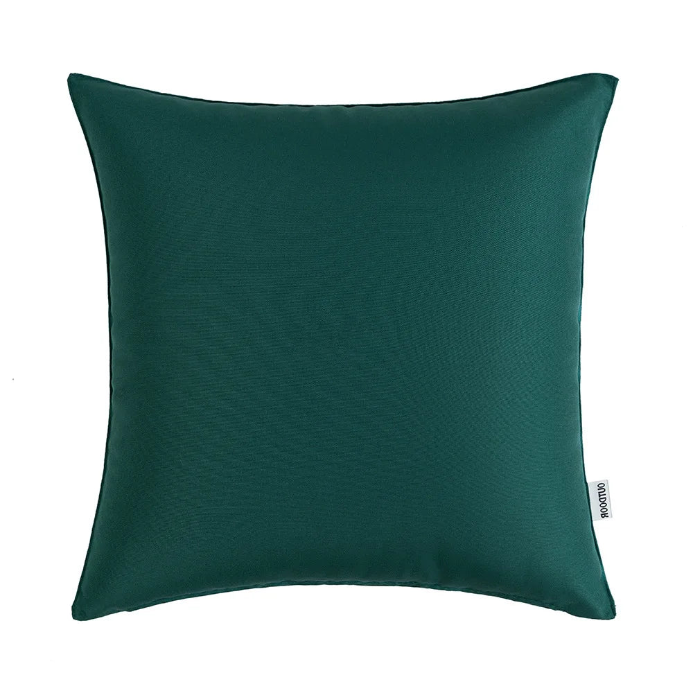 A dark emerald green linen-textured cushion cover pillow.