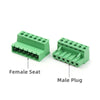 A female seat and a male plug of a green solderless screw terminal block connector for PCB insertion.