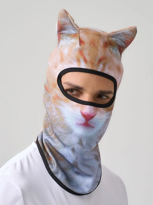 A person wearing a cat ear balaclava with orange and white tabby stripes.