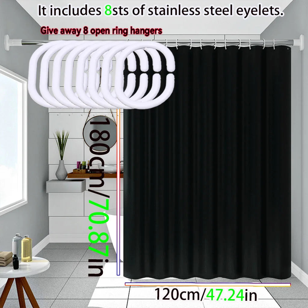 Solid black waterproof PEVA shower curtain hanging in a bathroom setting.
