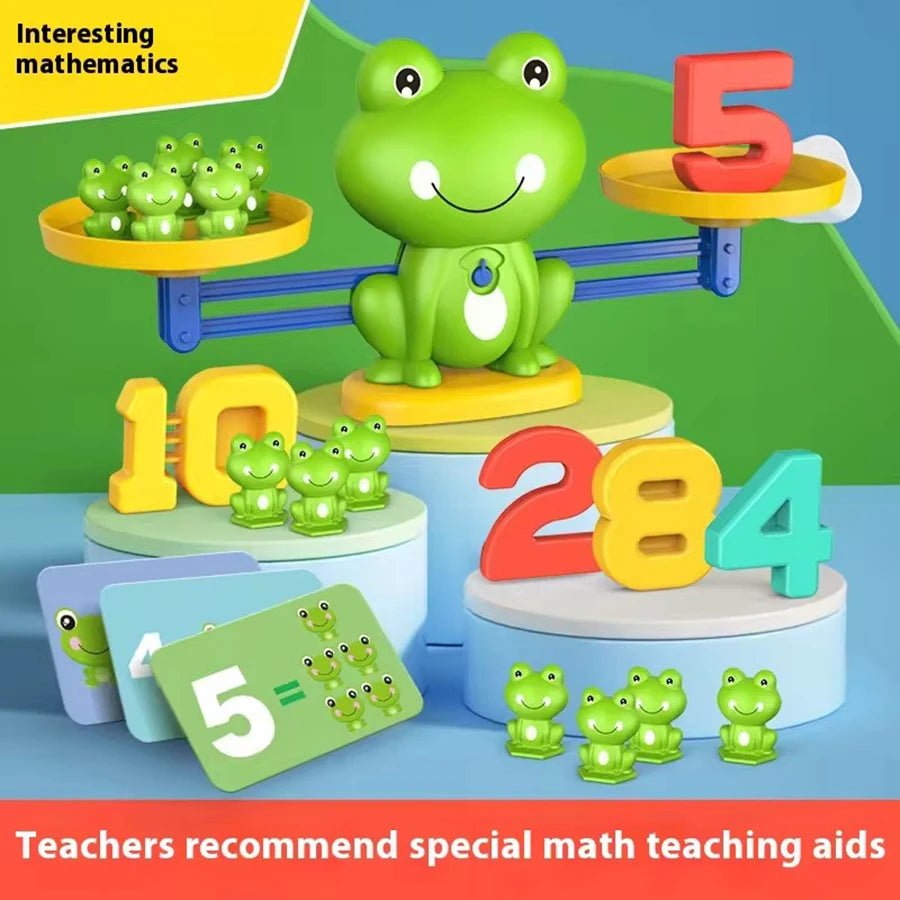 A green frog toy is balanced on a beam, demonstrating math concepts like addition and subtraction.