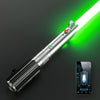 A silver lightsaber with a green blade is shown next to a smartphone.