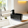 A black soap pump dispenser sits on a white kitchen countertop next to a silver faucet and wooden dish brushes.
