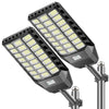 A black solar-powered LED security flood light with multiple bright white LEDs mounted on a pole.