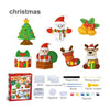 Kit de peinture pour enfants avec un arbre de Noël, un dinosaure et d'autres figurines, outils et peinture.