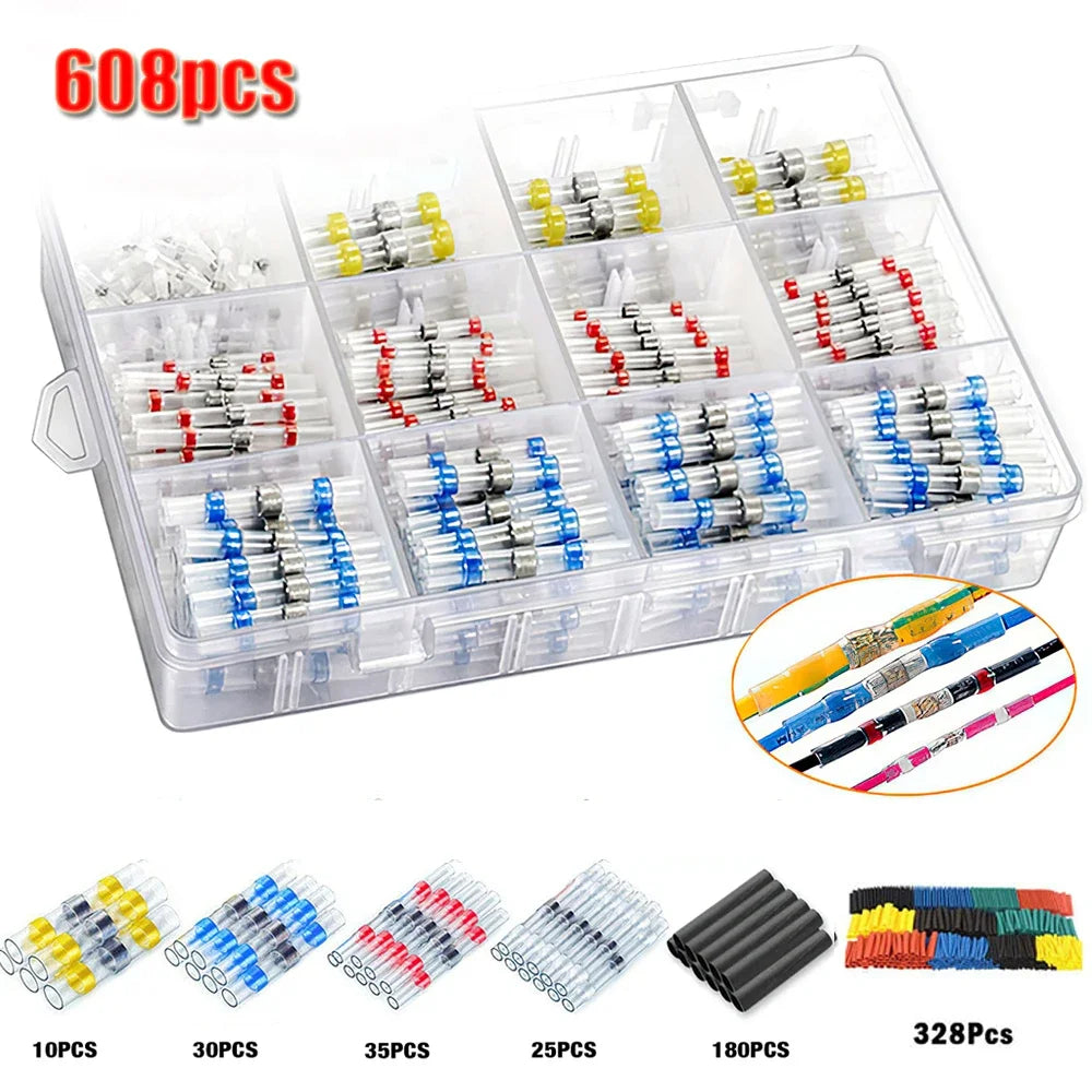 A plastic storage box containing various solder wire connectors and heat shrink components in different colors and quantities