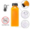 A clear glass juice bottle filled with orange liquid, showing instructions for hand washing and temperature guidelines.