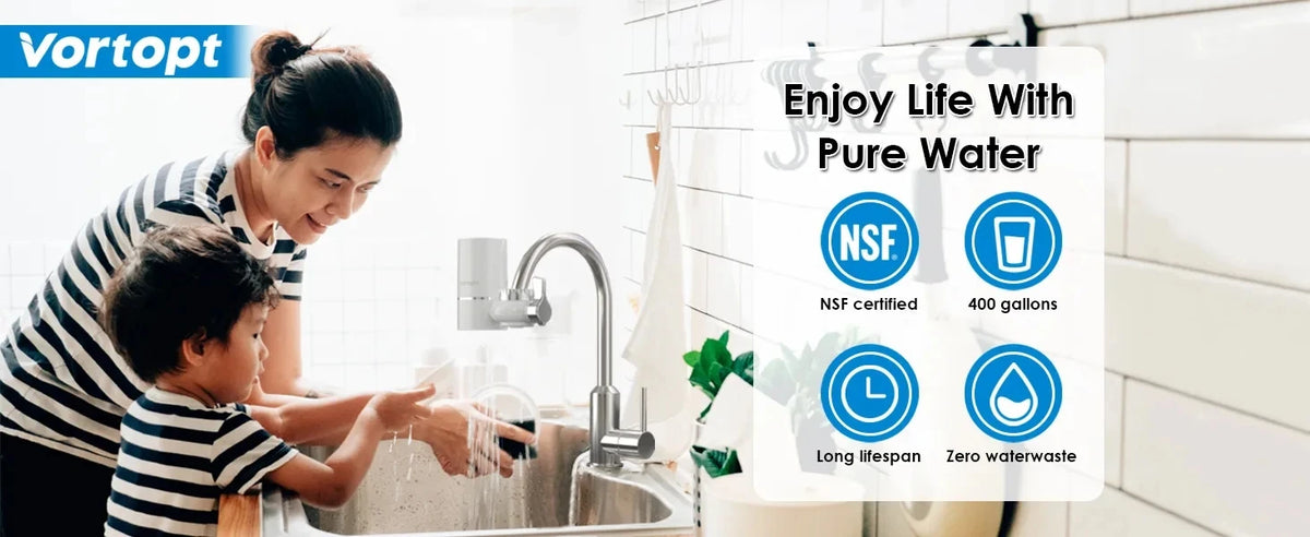 A mother and child are using a faucet mount water filter in a kitchen sink.