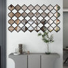 Moroccan-inspired decorative mirror wall stickers arranged in a diamond pattern on a white wall.