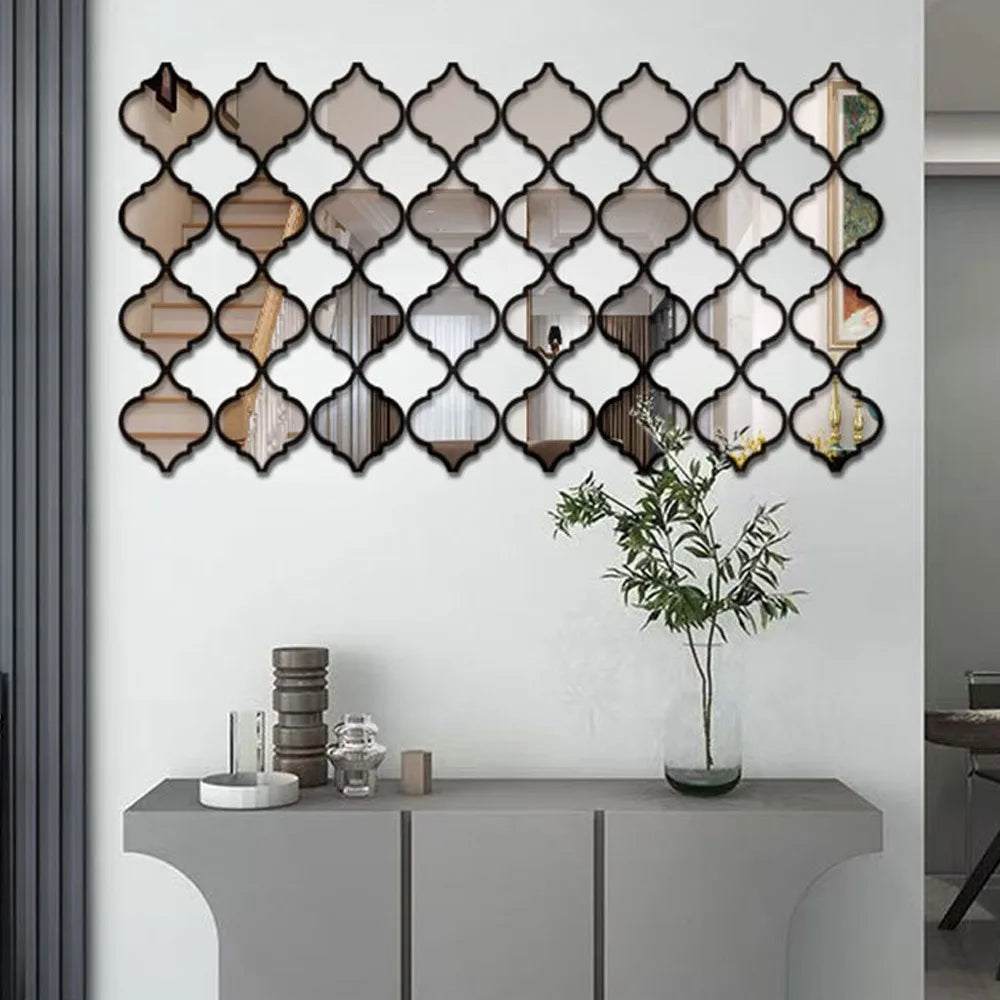 Moroccan-inspired decorative mirror wall stickers arranged in a diamond pattern on a white wall.