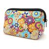 A colorful floral patterned waterproof neoprene cosmetic bag with a black zipper.