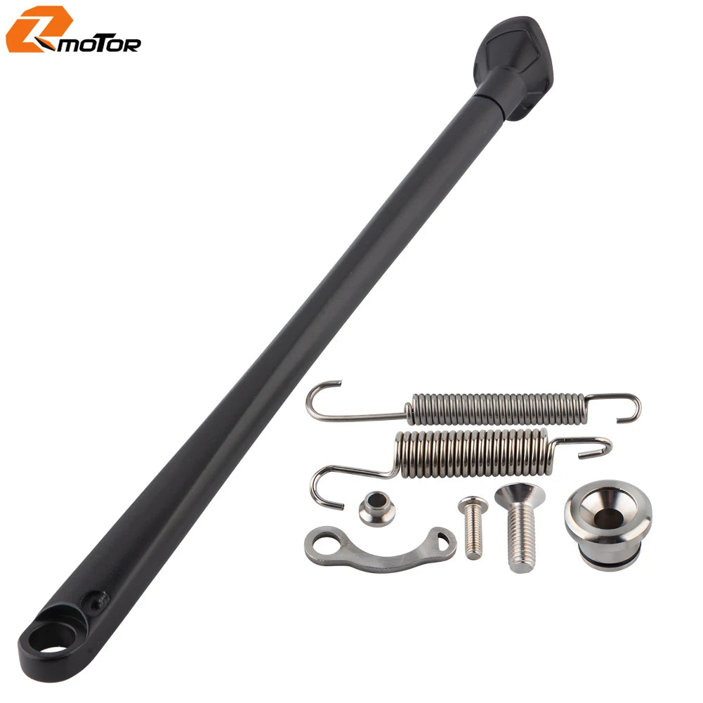 Black motorcycle side stand kit with ABS foot, including a rod and various springs and hardware.