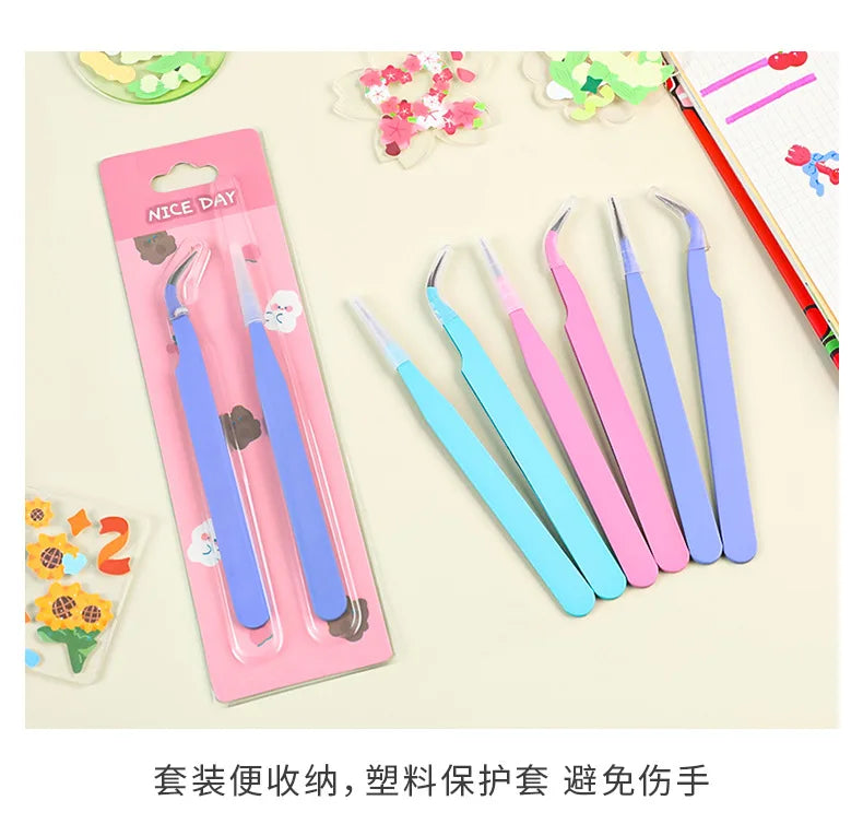 A set of colored craft tweezers for macaron color work, including various shades of pink and blue.