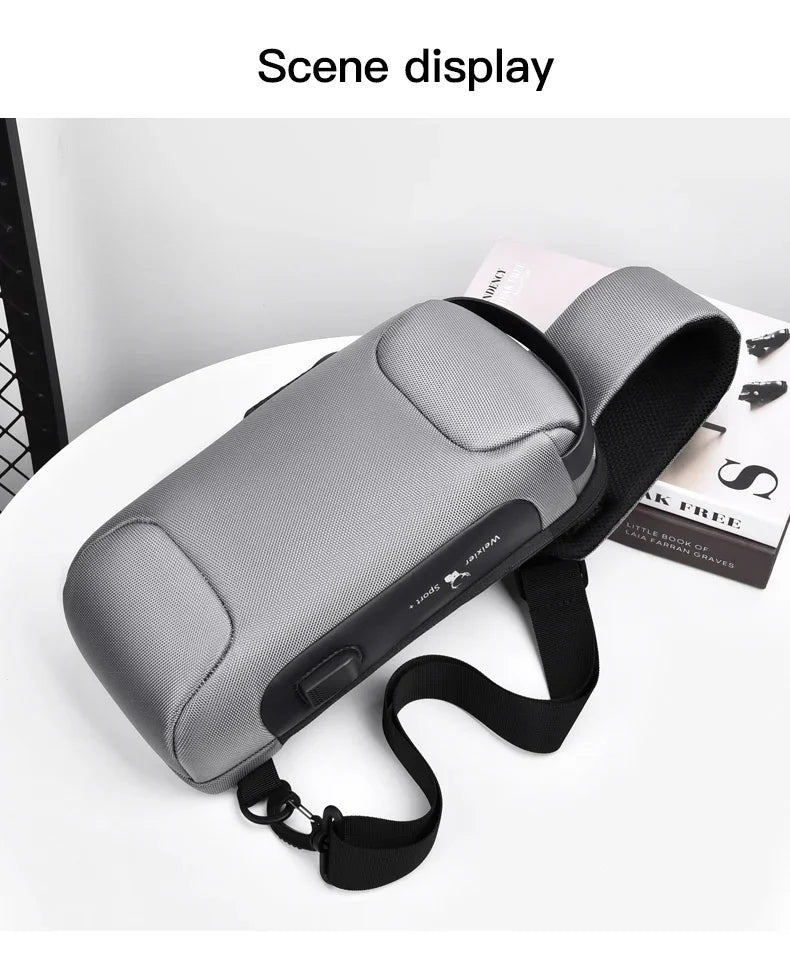 Bolso cruz unisex gris para hombre con función anti-robo, mostrado sobre una superficie blanca.
