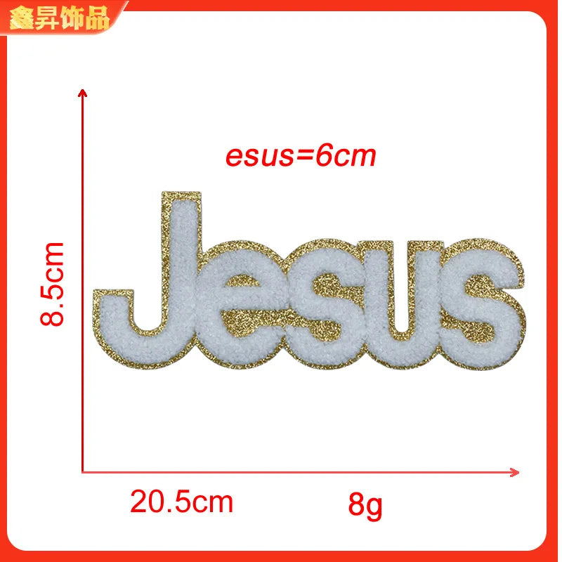 A gold glitter Jesus patch measuring 6cm in height and 20.5cm in length, used for embroidery or iron-on applications.