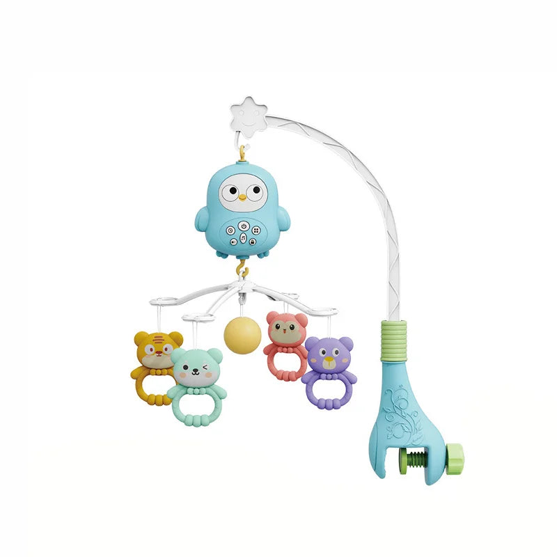 A musical baby crib mobile featuring an owl, a yellow ball, and a pink bear, designed for soothing sounds.