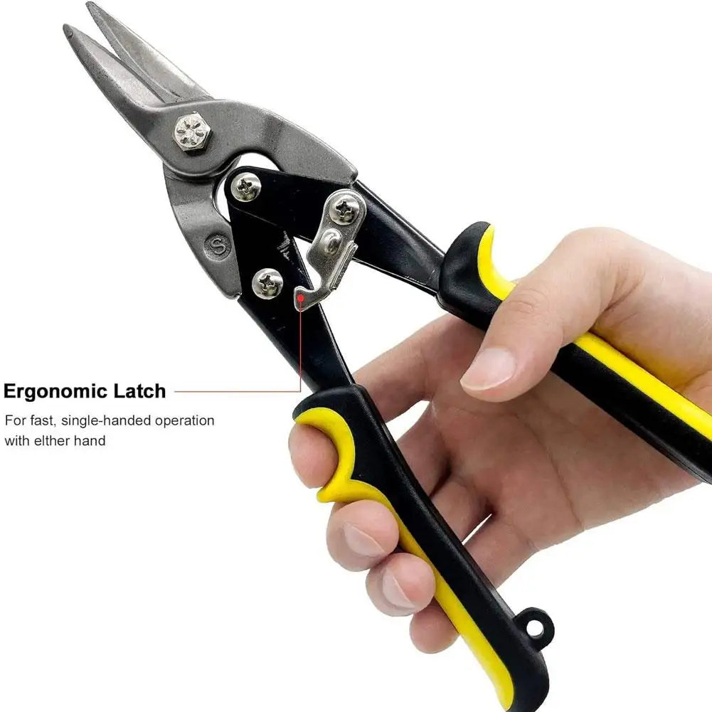 A hand holds a pair of black and yellow heavy-duty aviation snips for sheet metal cutting.