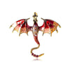 An enamel dragon brooch featuring iridescent scales and rhinestone accents, displayed against a white background.