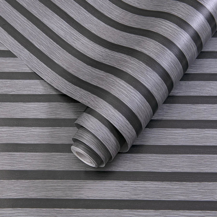 Roll of self-adhesive 3D wall stickers with a striped pattern shown diagonally.