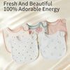 A collection of pink and white cotton baby bibs with floral and star patterns displayed on a light background.
