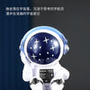 A white and blue handcrafted astronaut figurine resin spaceman desk decor.