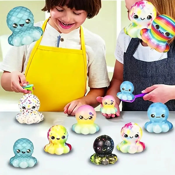 Un enfant avec divers jouets anti-stress colorés sur une table.