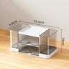 A white desk organizer with clear acrylic drawers and compartments shown from the side.