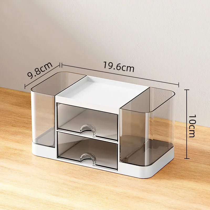 A white desk organizer with clear acrylic drawers and compartments shown from the side.