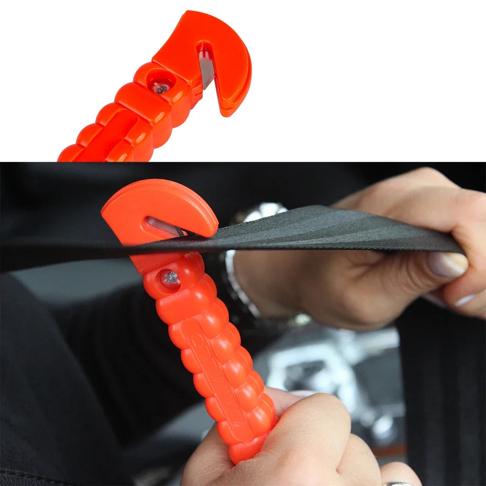 An orange emergency escape hammer is shown being used to cut a seatbelt, demonstrating its function.