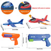 A foam plane launcher toy with an elliptical head and a pistol-shaped blaster are shown.