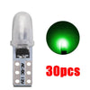 A single T5 wedge LED bulb with a silver base and clear glass, shown next to a green illuminated light source.