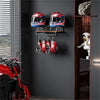 A display featuring red and blue motorcycle helmets and leather gloves mounted on a dark wooden wall shelf.